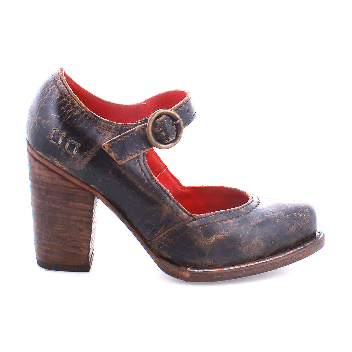 Introducing the Ishtar by Bed|Stü—a vintage-inspired women’s Mary Jane pump, crafted with a distressed brown leather upper, accented by a bold chunky wooden block heel, red inner lining, and an adjustable buckle strap.