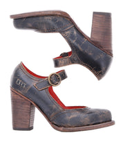 Two vintage-inspired, dark brown Bed|Stü Ishtar Mary Jane pump-style high heel shoes with wooden block heels and an adjustable round buckle strap, shown from the side.