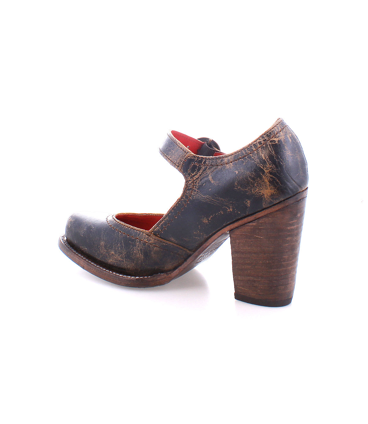 A single Ishtar Mary Jane pump by Bed|Stü, crafted from worn brown leather with an adjustable strap and a chunky block heel, is shown in a side view against a white background.