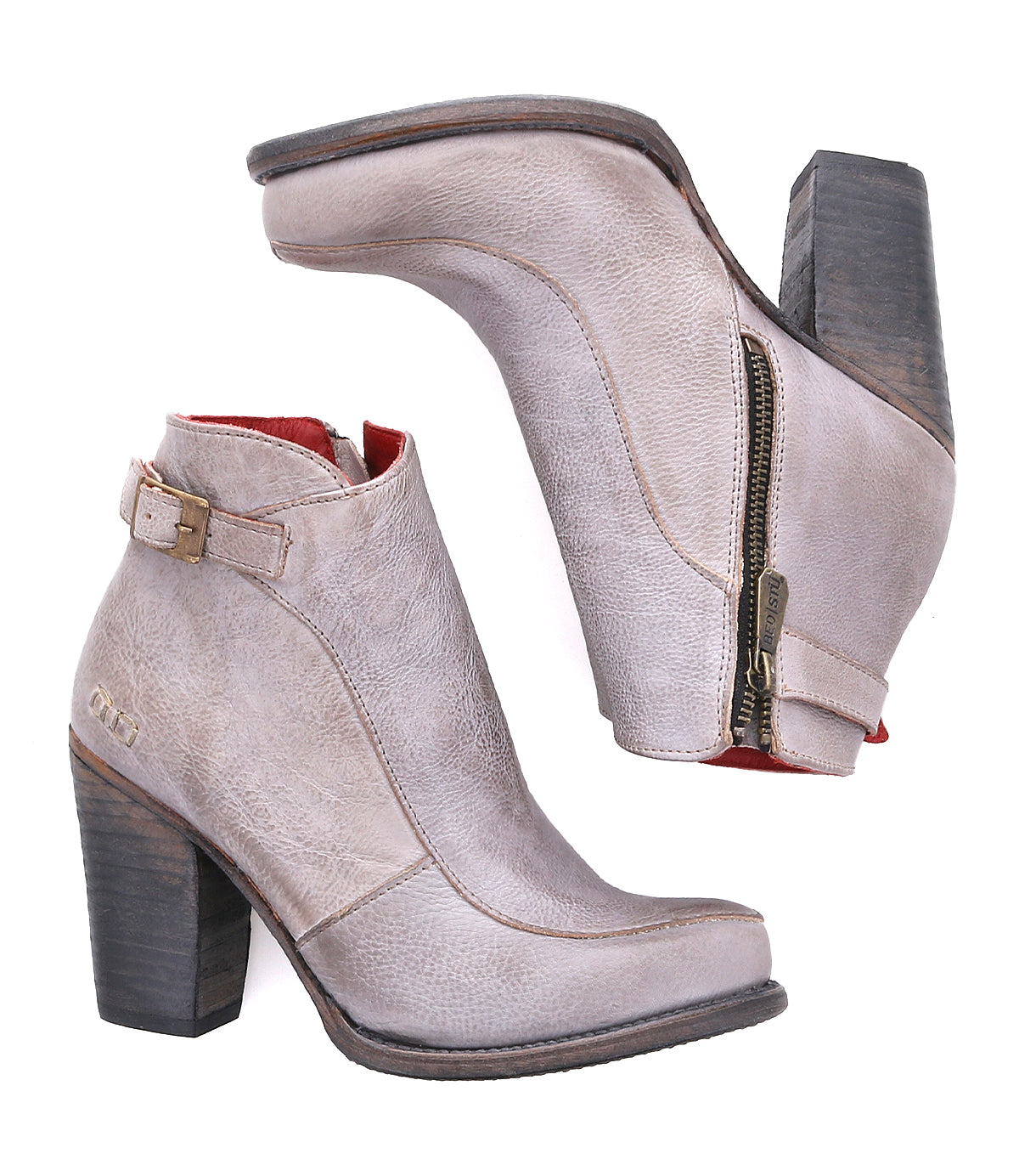 A pair of Bed|Stü Isla ankle boots in light brown smooth leather, featuring side zippers, chunky heels, and buckled straps, displayed on a white background.