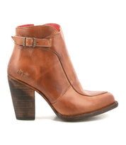 The Isla by Bed|Stü is a brown smooth leather ankle boot featuring a chunky high heel, side buckle strap, and stitched detailing, photographed against a white background.
