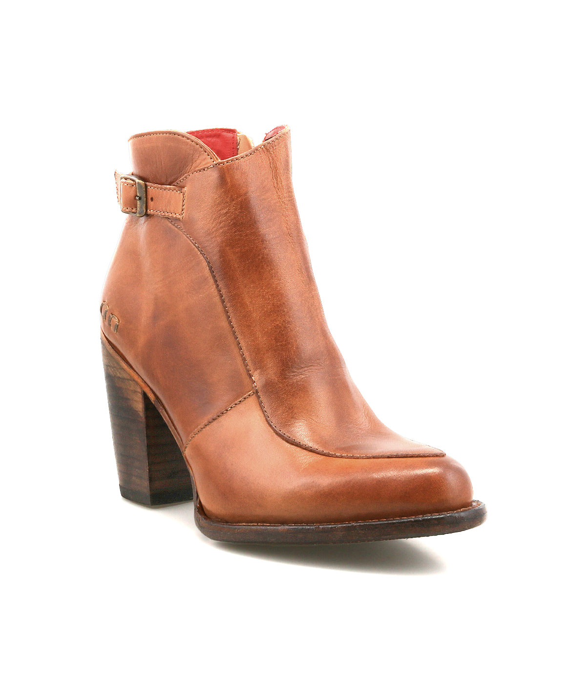 Introducing the Isla bootie by Bed|Stü—a brown, smooth leather heeled bootie featuring a medium stacked heel, side buckle detail, and a slightly pointed toe, displayed on a white background.
