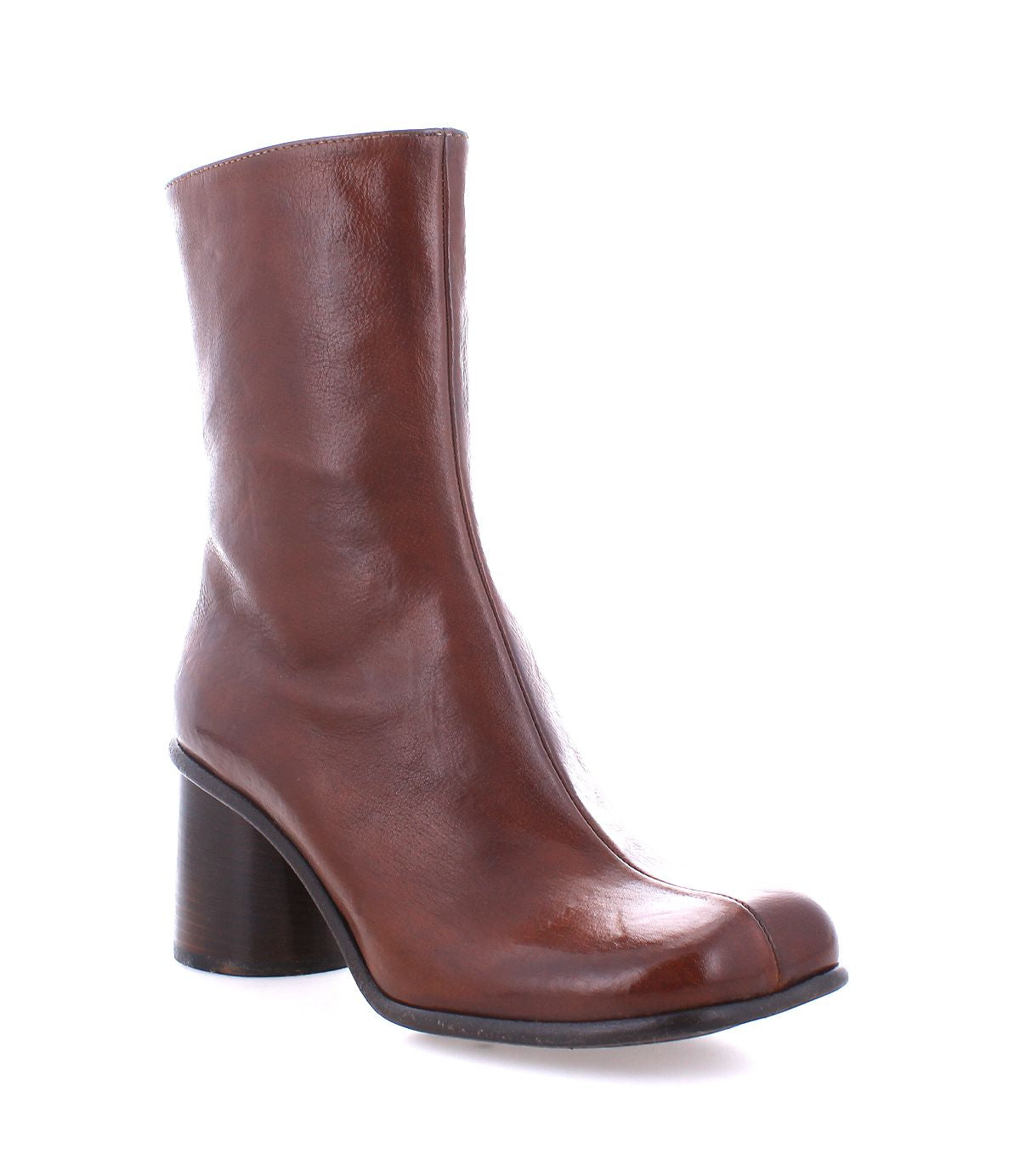 Handcrafted from premium Italian leather, the Isodora ankle boot by Bed|Stü showcases a rich brown hue, a rounded toe, and a chunky mid-height heel, photographed against a white background. This classic design is enhanced with Blake-stitched construction for lasting durability and timeless style.