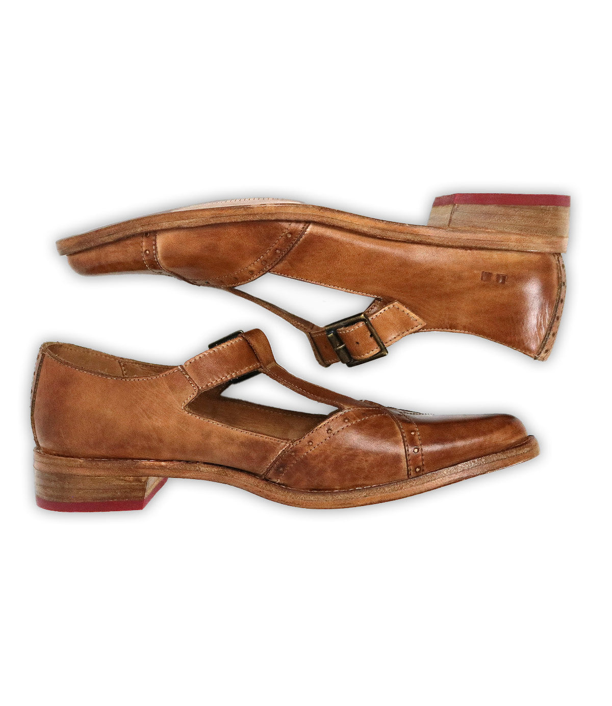 A side profile view of Bed|Stü's Jenny shoes—a pair of brown leather Mary Jane-style T-strap shoes featuring low wooden heels, cushioned insoles, side buckles, and signature red soles—displayed against a white background.