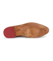 The image shows the worn leather sole of the Bed|Stü Jenny dress shoe, featuring a red low heel and visible scuff marks.