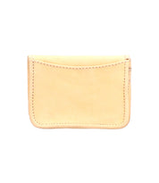 The Bed|Stü Jeor is a small, rectangular card wallet crafted from light tan rustic leather with visible stitching and convenient credit card slots, displayed against a white background.