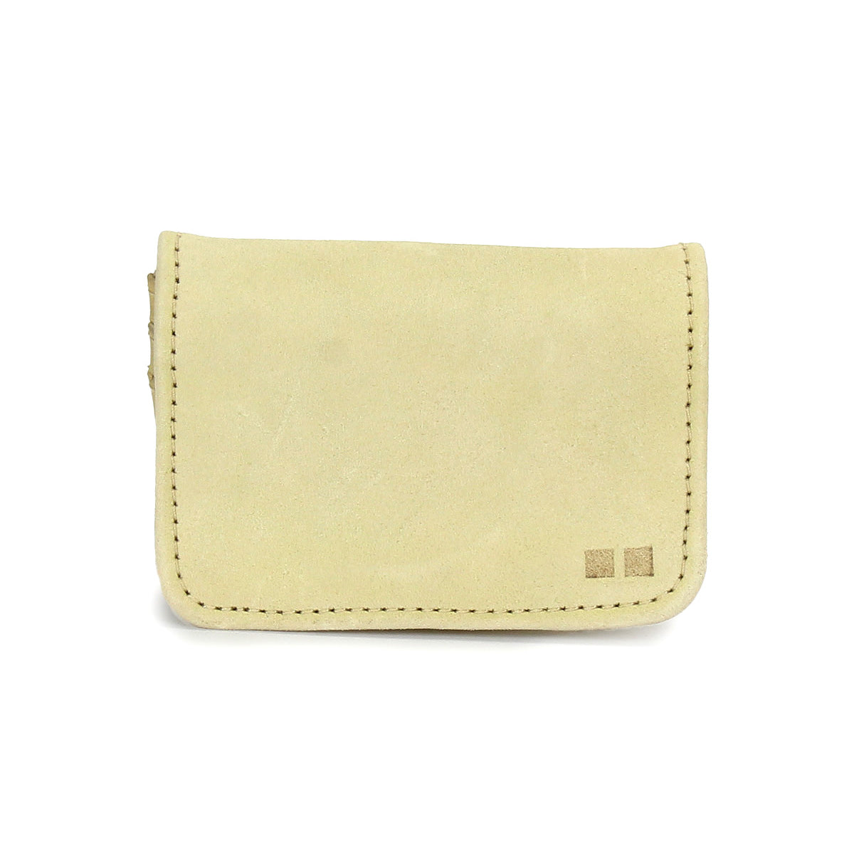 Introducing the Jeor compact wallet by Bed|Stü: a small rectangular wallet crafted from beige suede with visible stitching and two distinctive square accents on the lower right corner, featuring convenient credit card slots. Photographed against a white background.