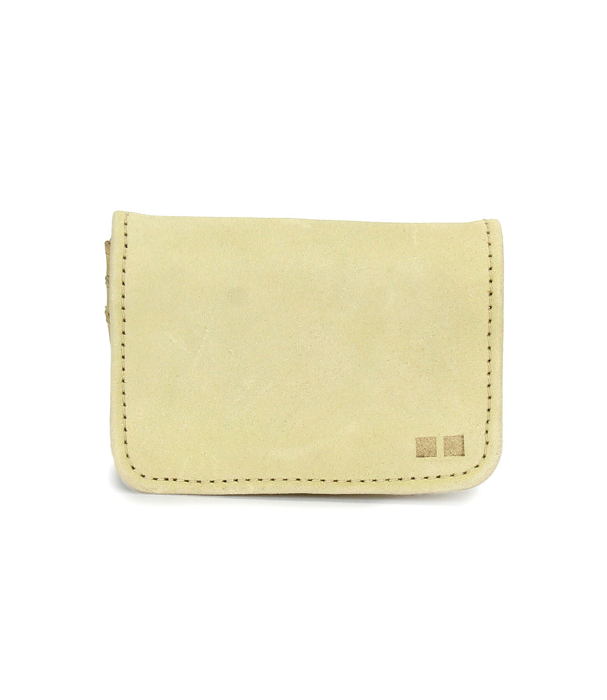 Introducing the Jeor compact wallet by Bed|Stü: a small rectangular wallet crafted from beige suede with visible stitching and two distinctive square accents on the lower right corner, featuring convenient credit card slots. Photographed against a white background.