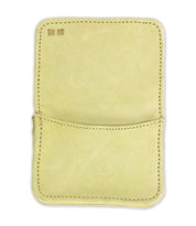 The Jeor wallet by Bed|Stü is a compact beige leather pouch featuring visible stitching, an open design with a single main pocket, and a small rectangular accent in the top left corner—offering a modern take on the classic rustic leather card wallet.