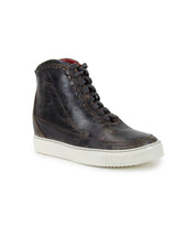 A single black high-top leather sneaker, the Joyce II by Bed|Stü, featuring visible creases, brown stitching, a lace-up front with black laces, and a white rubber sole, displayed on a white background.