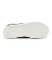 The Bed|Stü Joyce II is pictured lying on its side, displaying a clean white rubber sole characterized by a central rectangular mark and subtle horizontal grooves for traction, while its classic lace-up front ensures secure comfort.