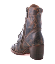 Back view of the Bed|Stü Judgement boot in brown distressed leather, featuring a chunky block heel, side zipper, visible stitching, and lace-up design, photographed on a white background.