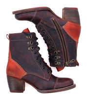 Pair of Bed|Stü Judgement boots in brown and red leather featuring lace-up fronts with metal eyelets, cap toe detailing, block heels, side zippers, and visible stitching—one boot is displayed upright while the other lies on its side.