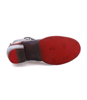 Bottom view of the Bed|Stü Judgement leather lace-up boot featuring a textured red sole, visible Bed|Stü branding, and stitching around the edge.