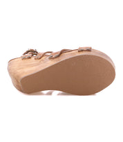 Bottom view of the Bed|Stü Juliana II platform sandal in tan, featuring a textured rubber sole, visible leather straps along the edges, and a strappy upper that adds stylish detail to its modern design.