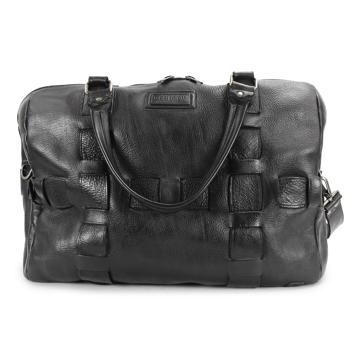 The Bed|Stü Keg is a black vegetable tanned leather duffel bag featuring dual handles, a detachable shoulder strap, and stitched detailing on the front.