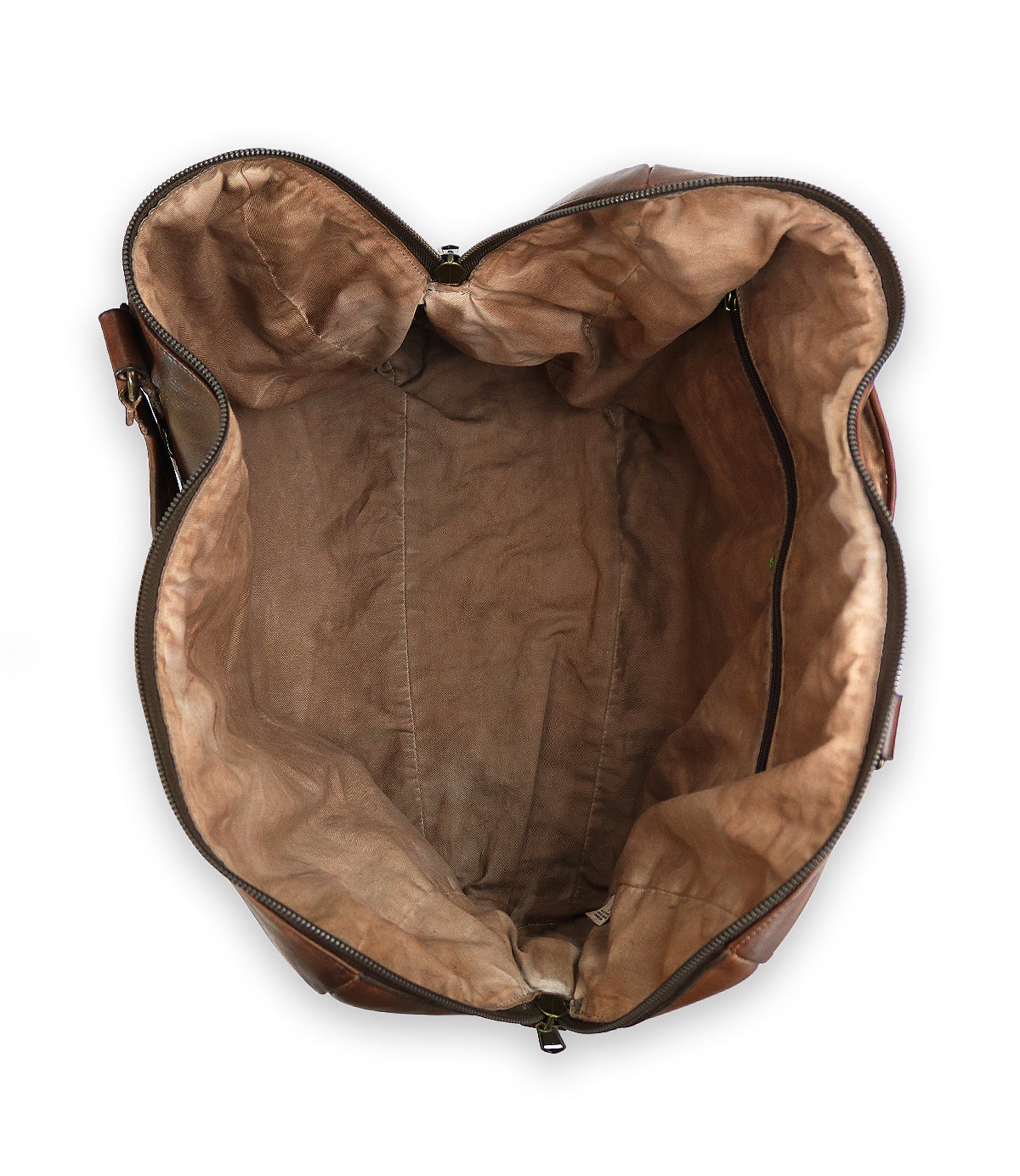 An overhead view of the Bed|Stü Keg, an open brown duffle crafted from vegetable tanned leather with a tan fabric lining.