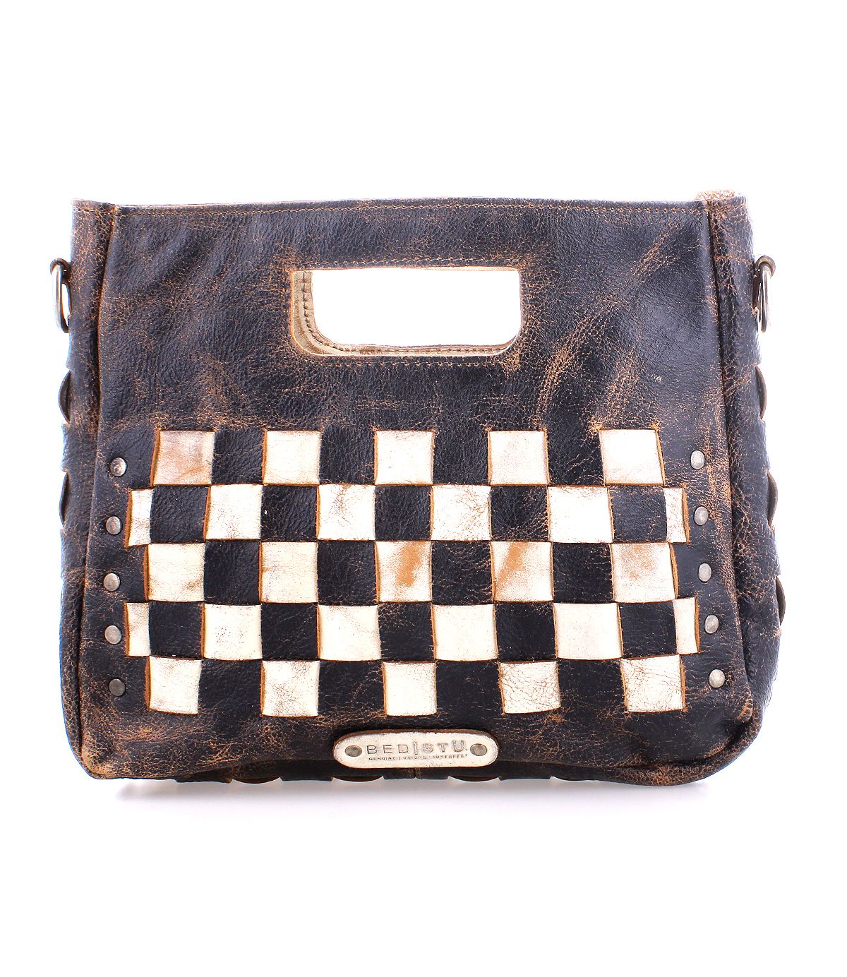 The Keiki crossbody bag by Bed|Stü is a rectangular black leather accessory featuring a bold white and gold checkerboard pattern on the front, complete with a built-in handle, metal studs, an adjustable strap for versatile wear, and a metal brand plate at the bottom center.
