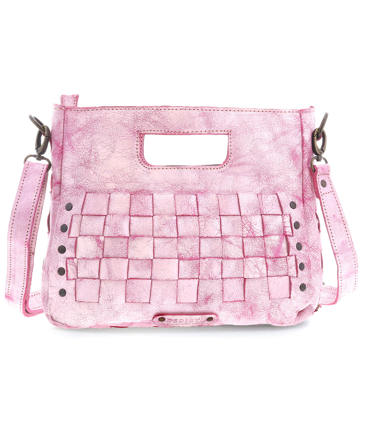 Introducing the Keiki by Bed|Stü—a pink leather handbag featuring a woven checkerboard front panel, accented with metal studs. The bag includes a detachable, adjustable strap and a zip-top closure to keep your essentials secure while offering contemporary style.