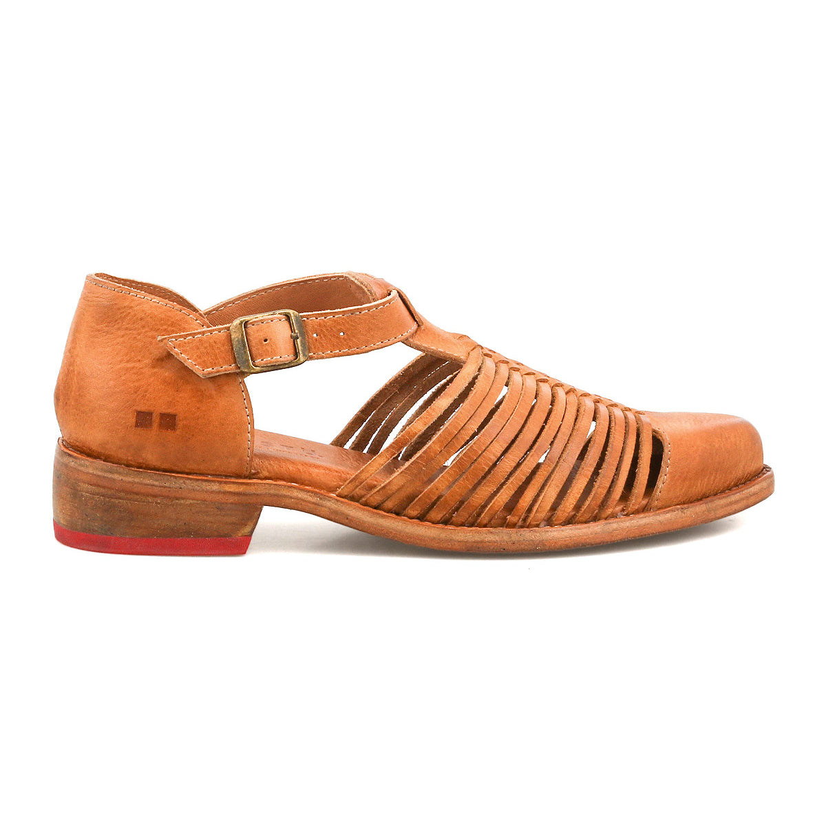 The Kenna sandal by Bed|Stü is a brown leather closed-toe design featuring an adjustable ankle strap, multiple slender side straps with woven cutouts, a low heel, and a subtle red accent on the sole.