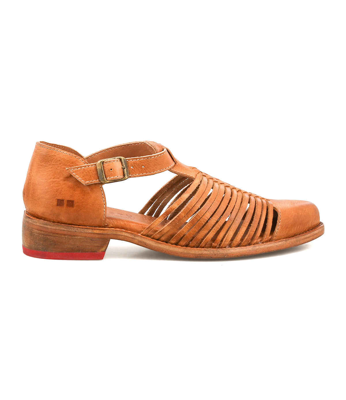 The Kenna sandal by Bed|Stü is a brown leather closed-toe design featuring an adjustable ankle strap, multiple slender side straps with woven cutouts, a low heel, and a subtle red accent on the sole.