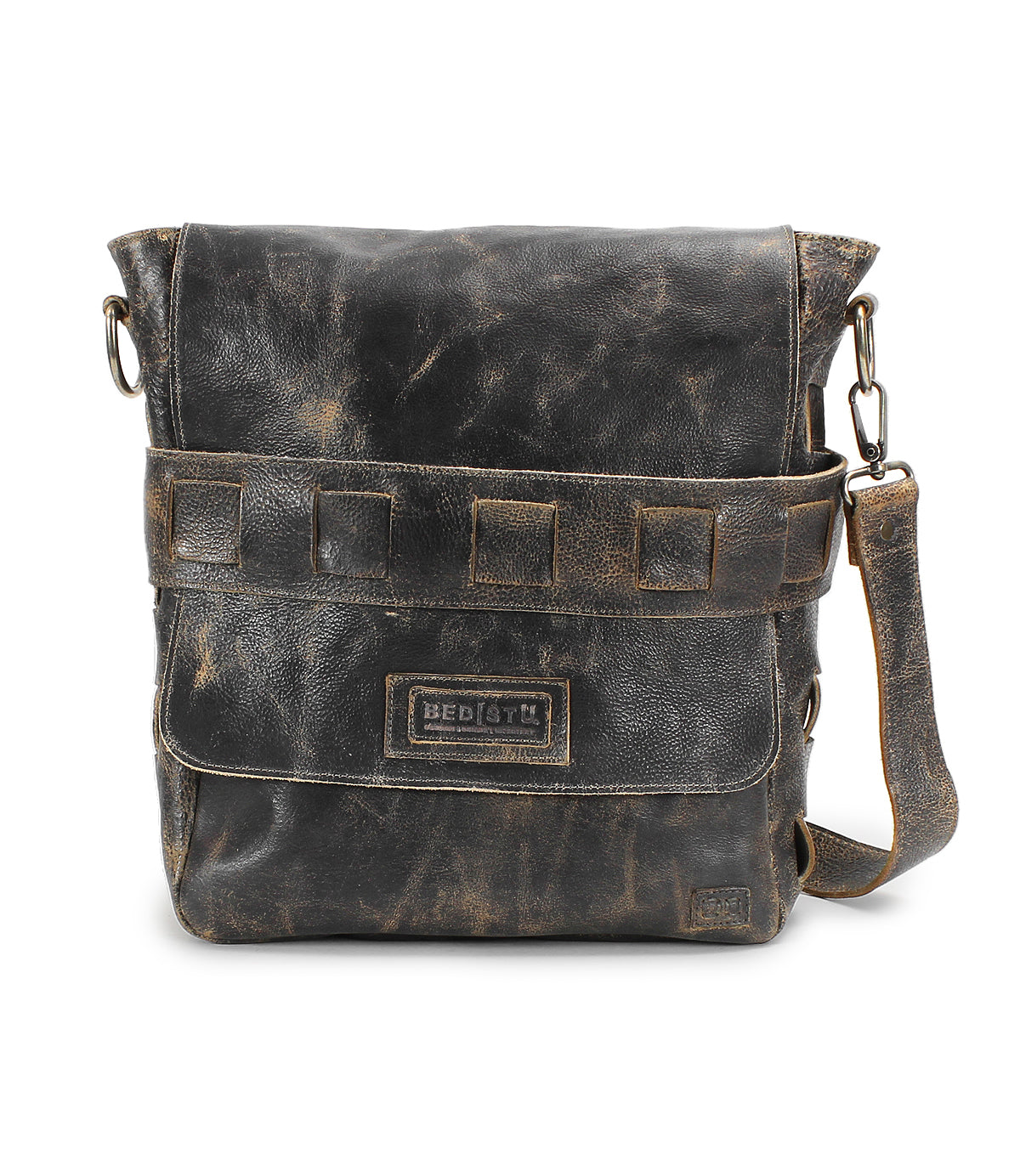 Introducing the Kure crossbody bag from Bed|Stü—a distressed brown, vegetable-tanned leather messenger featuring a front flap, square-stitched detailing, and an adjustable shoulder strap. The Kure blends classic style with Bed|Stü’s renowned durable craftsmanship, making it a versatile choice for everyday use.