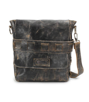 Introducing the Kure crossbody bag from Bed|Stü—a distressed brown, vegetable-tanned leather messenger featuring a front flap, square-stitched detailing, and an adjustable shoulder strap. The Kure blends classic style with Bed|Stü’s renowned durable craftsmanship, making it a versatile choice for everyday use.