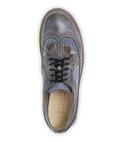 Top view of the Lita K oxford shoe by Bed|Stü in gray leather, featuring an elegant wingtip toe, intricate brogue details, black laces, and "BED|STÜ" visible on the insole—a timeless classic from the brand’s signature collection.
