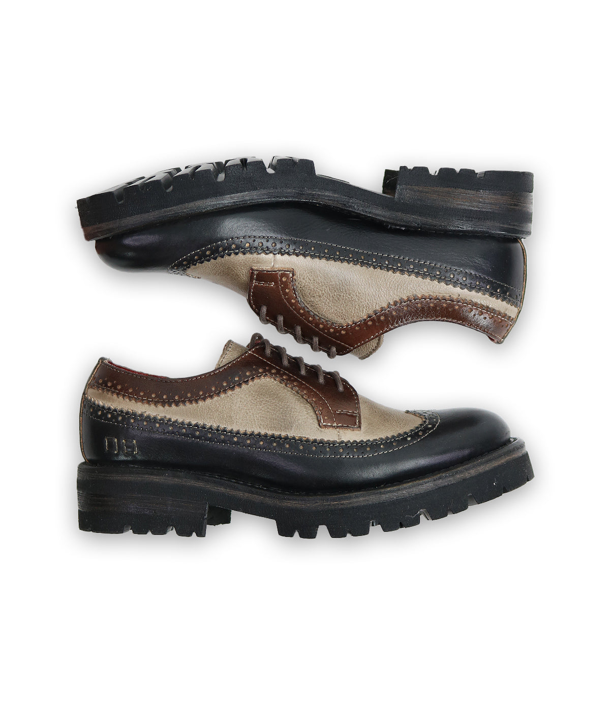 The Bed|Stü Lita K III dress shoes, featuring a two-tone brown and beige leather design with black soles, are displayed side by side on a white background, presenting a vintage-inspired style that effortlessly combines classic elegance with modern flair.