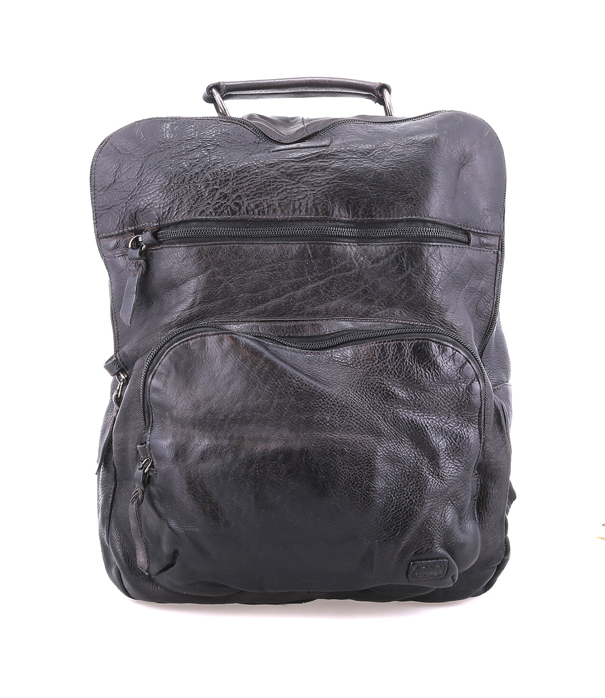 The Lafe backpack by Bed|Stü is a black leather anti-theft travel bag featuring a top handle and two front zippered pockets, displayed against a plain white background.