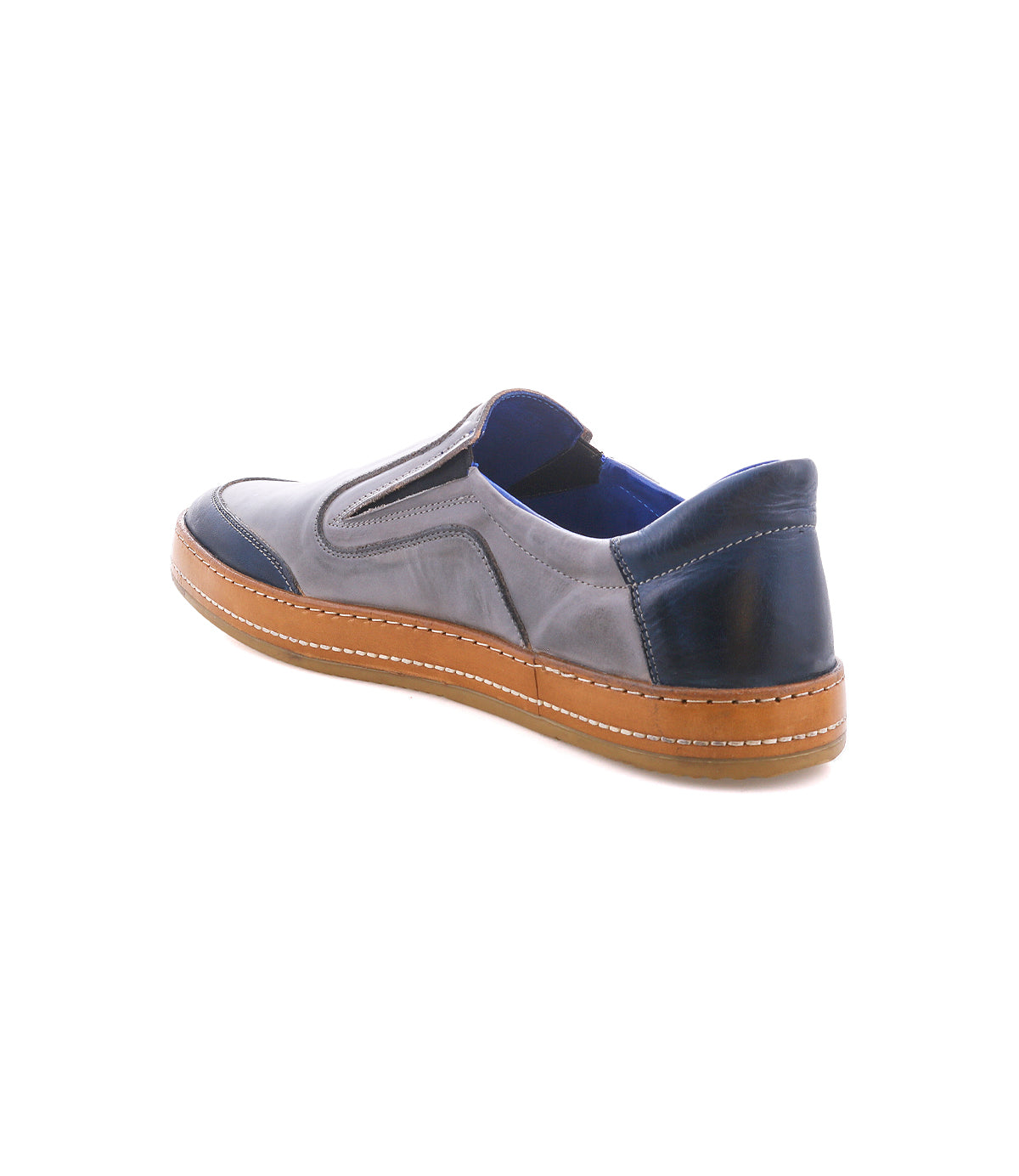 The Lanius slip-on shoe by Bed|Stü, shown at an angle against a white background, features gray and blue color blocking and a brown rubber sole.