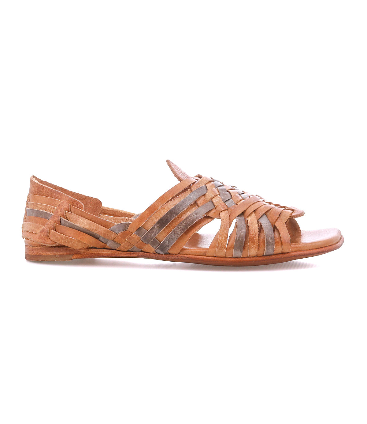 The Bed|Stü Lauren II is a brown hand-woven leather huarache sandal featuring woven straps and a closed heel, displayed in side profile on a white background and showcasing the craftsmanship of handcrafted footwear.