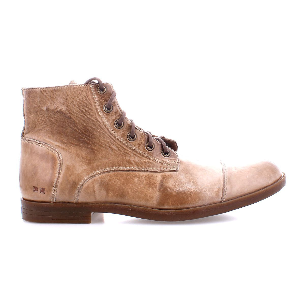 Introducing the Bed|Stü Leonardo: a single light brown leather lace-up boot with a slightly worn finish, low heel, and cap toe. This boot features a cushioned insole and flexible rubber outsole and is shown in profile facing left against a white background.