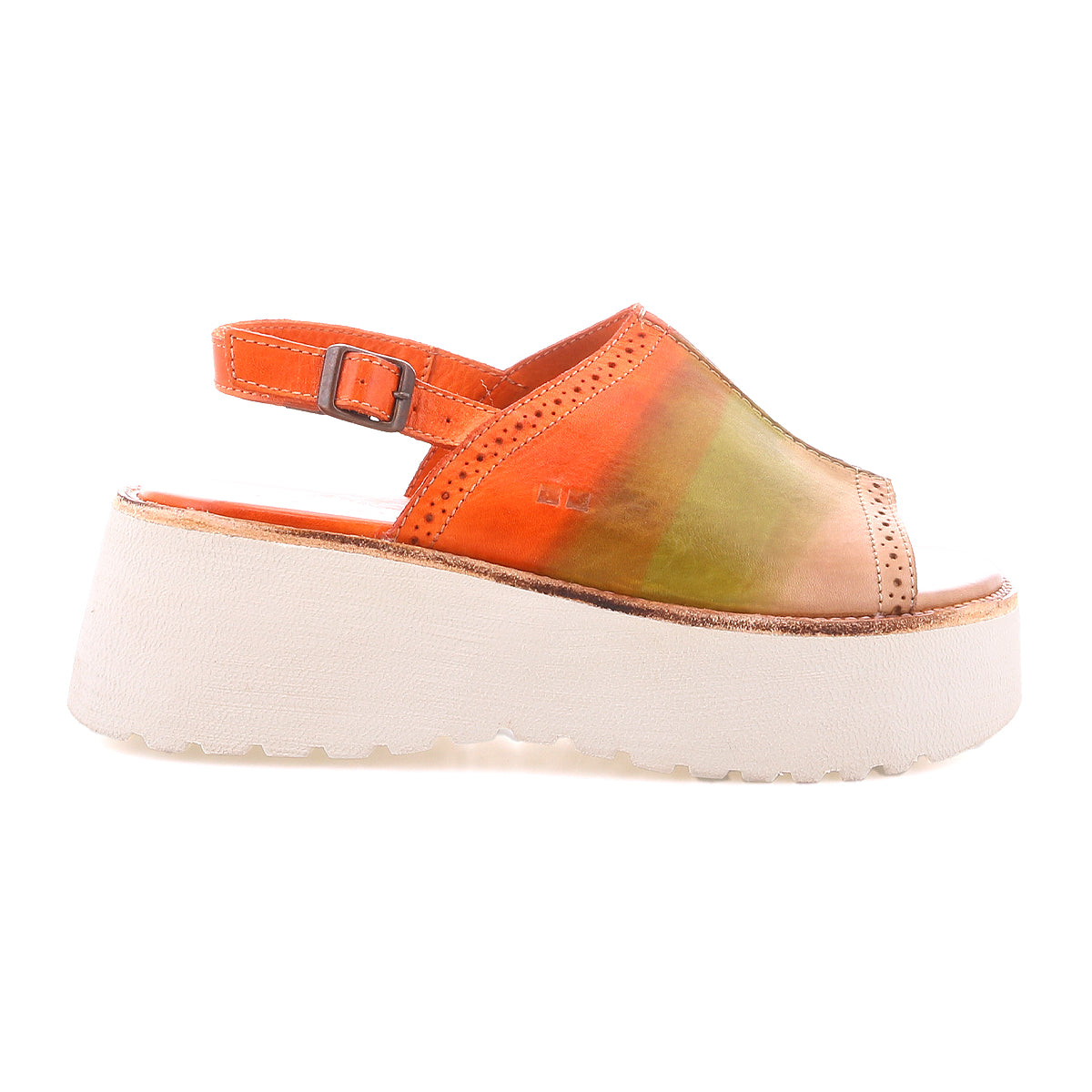 The Bed|Stü Library sandal features vibrant orange and green hues, an open-toe platform silhouette with a white chunky sole, and an adjustable ankle strap—seen from the side, it perfectly channels ‘90s style and retro footwear trends.