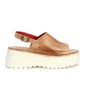 Step out in retro style with Bed|Stü's Library sandal: a brown leather slingback platform featuring an open toe, adjustable ankle strap, bold white sole, and striking red interior lining—an effortless ‘90s-inspired addition to your footwear collection.