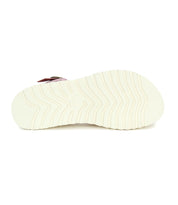 The image shows the bottom view of a white Lift sandal sole from Bed|Stü, featuring a wavy, grooved tread pattern typical of comfortable sandals designed for all-day wear.