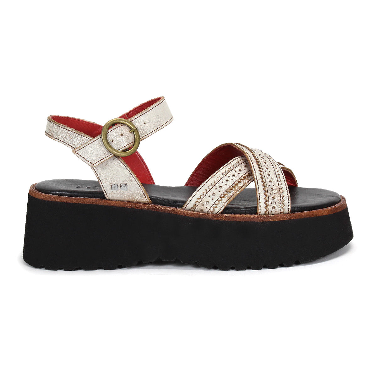 The Bed|Stü Lift sandal features white leather crisscross straps, a gold buckle, bold red interior detailing, and a thick black platform sole—shown in side view for a chic yet comfortable option.