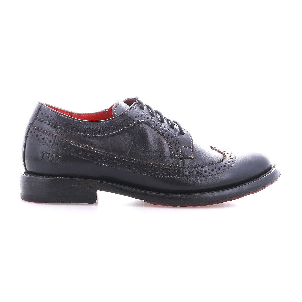 The Bed|Stü Lita K II is a single black leather dress shoe with classic brogue detailing and a wingtip toe, featuring decorative perforations, lace-up closure, and a low heel, shown in profile against a white background.