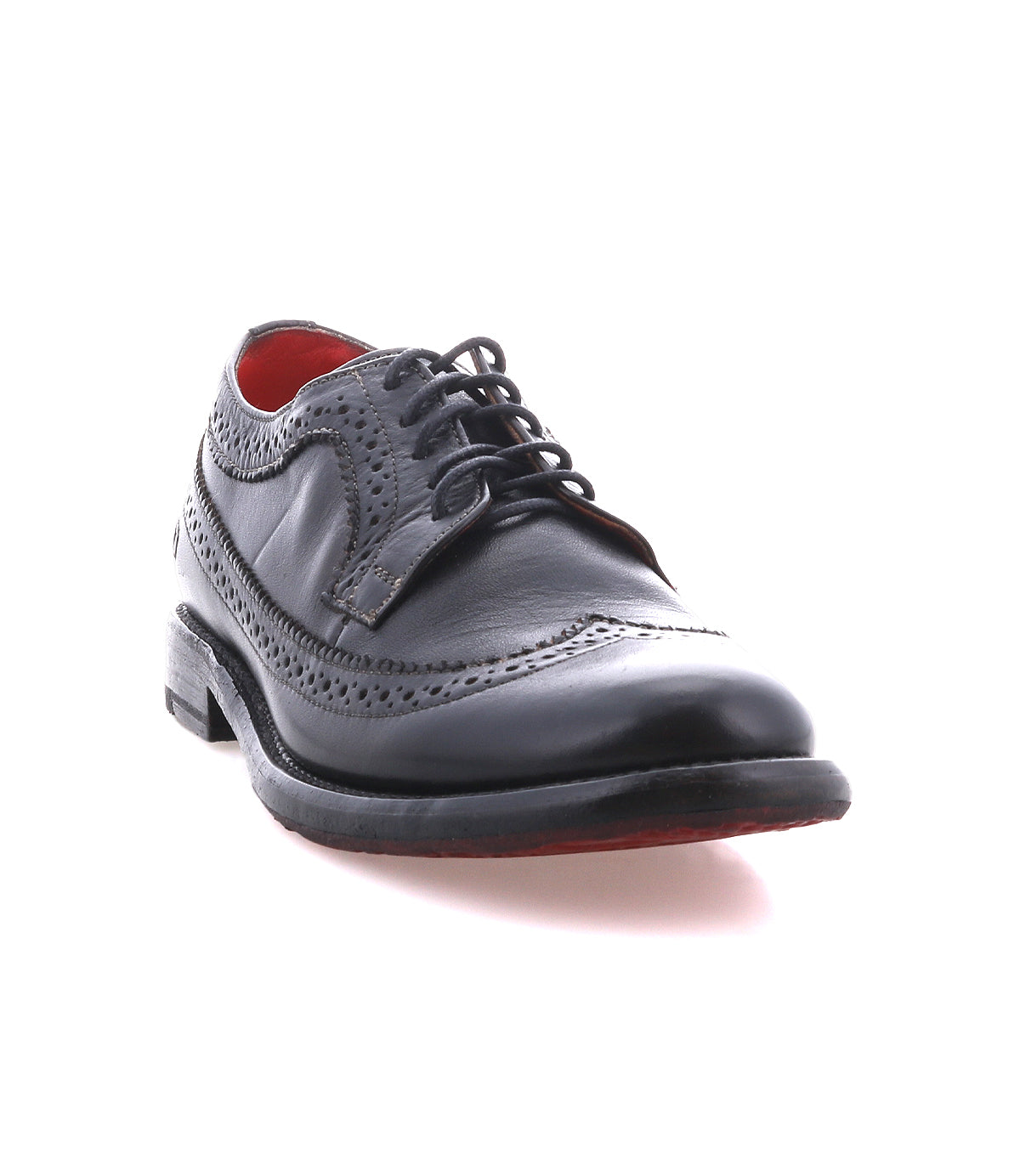Lita K II by Bed|Stü, a black leather derby dress shoe featuring brogue detailing and a wingtip toe, displayed at a slight left-facing angle on a white background.