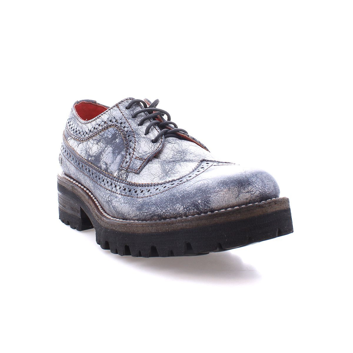 The Bed|Stü Lita K III is shown as a single gray leather dress shoe with brogue detailing, black laces, and a thick, rugged sole that evokes the charm of a vintage-inspired design, displayed on a white background.