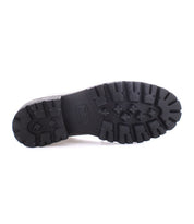Black rubber shoe sole with deep tread pattern, shown from the bottom against a white background—perfect for the Bed|Stü Lita K III, a retro-inspired sneaker crafted with canvas and leather.