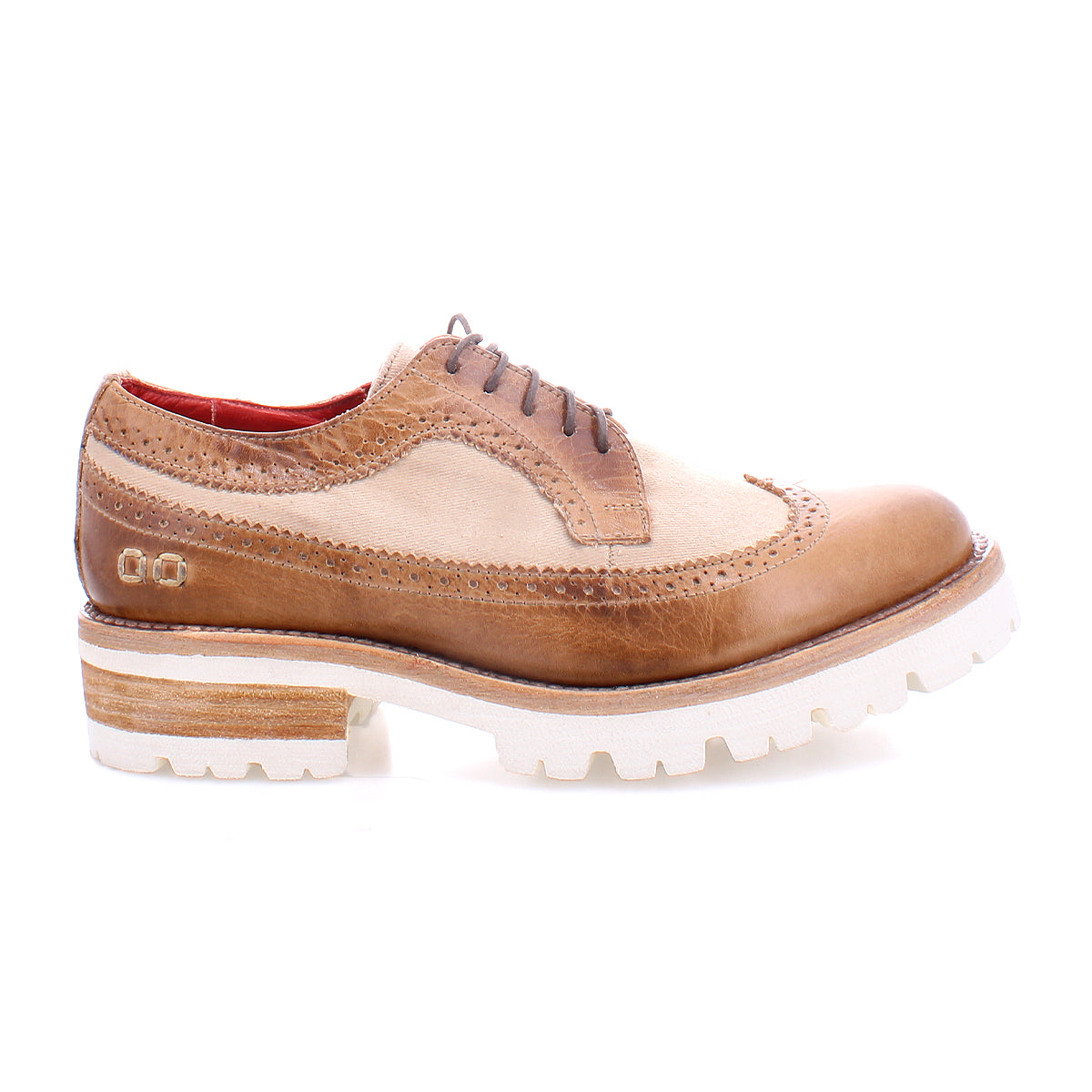 The Lita K III by Bed|Stü is a brown and beige leather oxford featuring brogue detailing, brown laces, and a white chunky sole. Shown in side profile on a white background, this vintage-inspired shoe blends classic elegance with modern appeal.