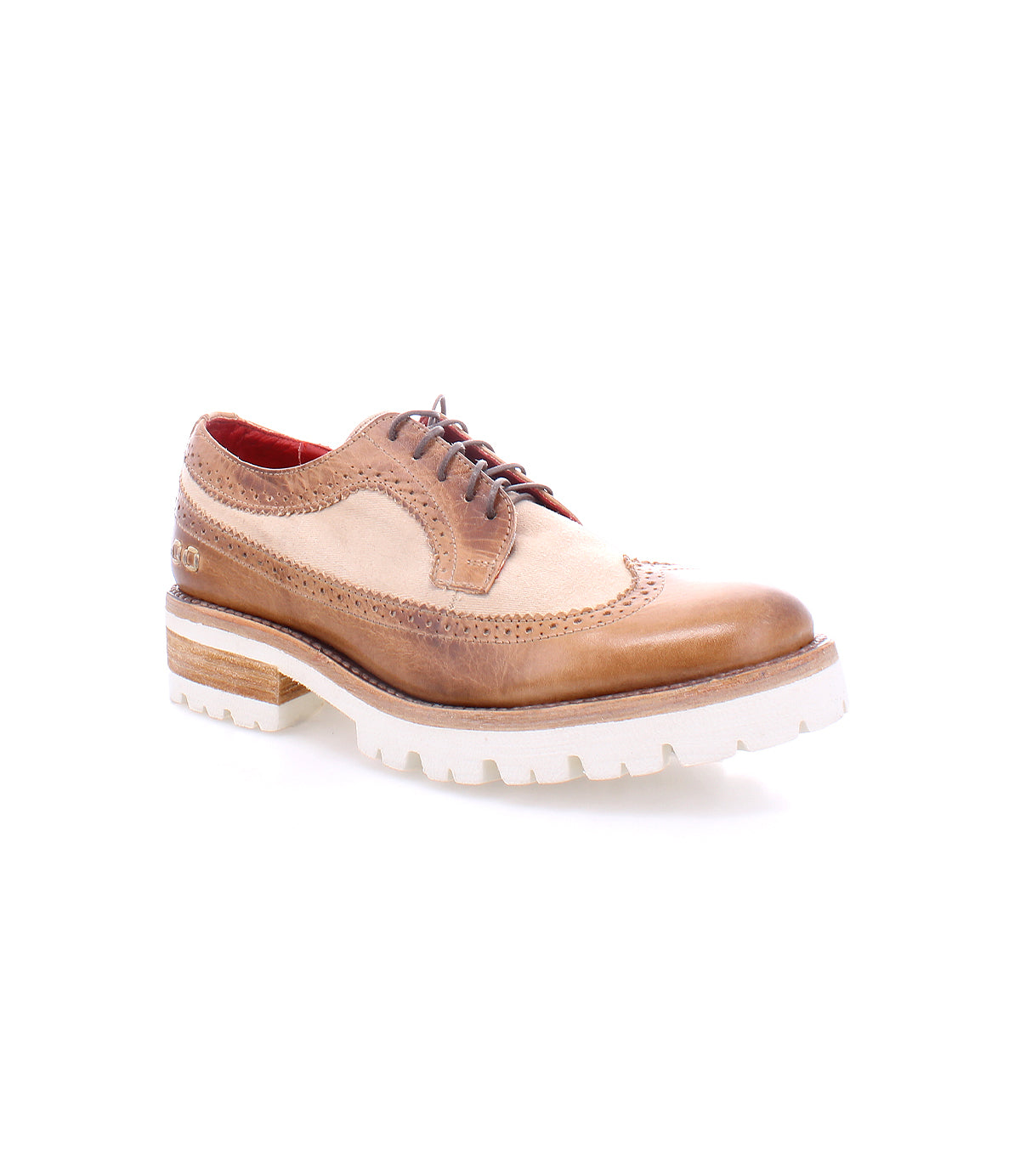 Introducing the Bed|Stü Lita K III, a vintage-inspired tan and beige wingtip oxford featuring brown laces, a white chunky sole, decorative perforations, and a stylish blend of canvas and leather—all showcased against a clean white background.