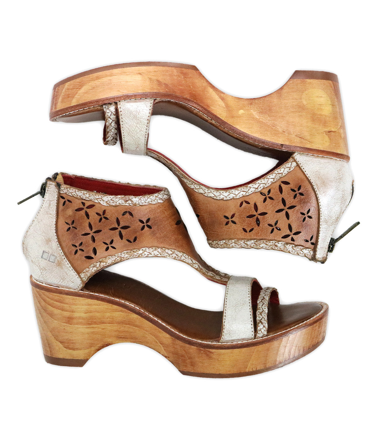 The Bed|Stü Locket women's wooden wedge sandals feature tan and metallic laser-cut floral leather straps, a cushioned footbed, and convenient back zipper closures, displayed from side and top views against a white background.