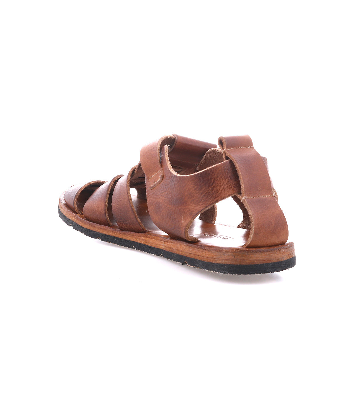 Lone sandals by Bed|Stü in brown distressed leather, shown from the back to highlight multiple straps and an antique brass buckle, featuring a flat black sole against a white background.