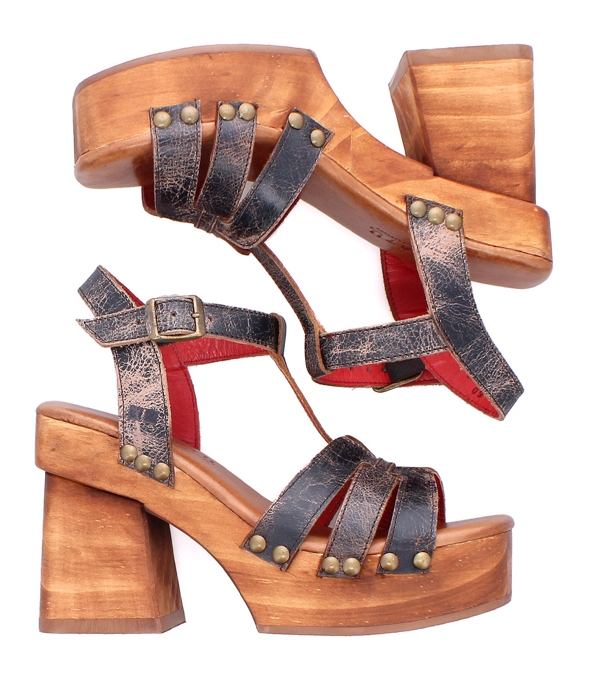 A pair of Bed|Stü Lyxon vintage-style black leather sandals featuring open toes, wooden chunky heels, brass rivets, a red interior lining, and buckle straps.