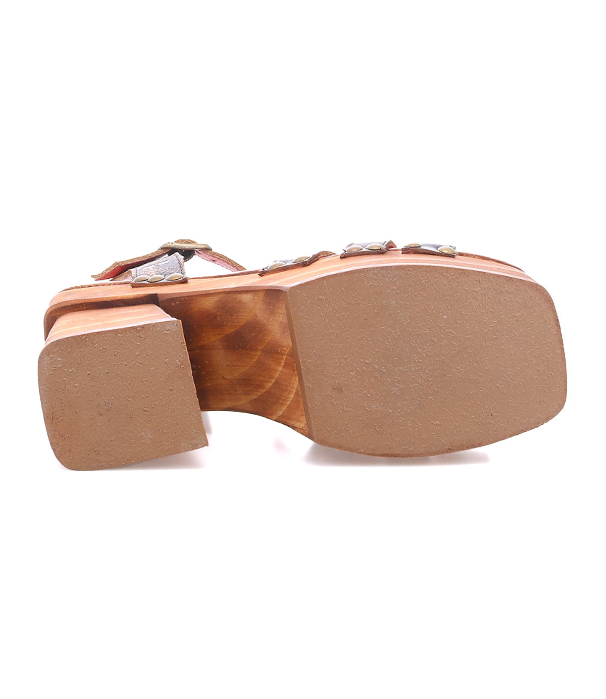Bottom view of the Bed|Stü Lyxon sandal in brown, showcasing its wooden platform heel, square toe, and textured rubber sole.