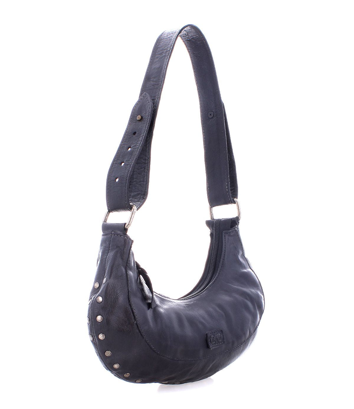 The Madre hobo bag by Bed|Stü is a statement-making black leather shoulder bag featuring metal studs along the side and an adjustable shoulder strap, showcased against a white background.