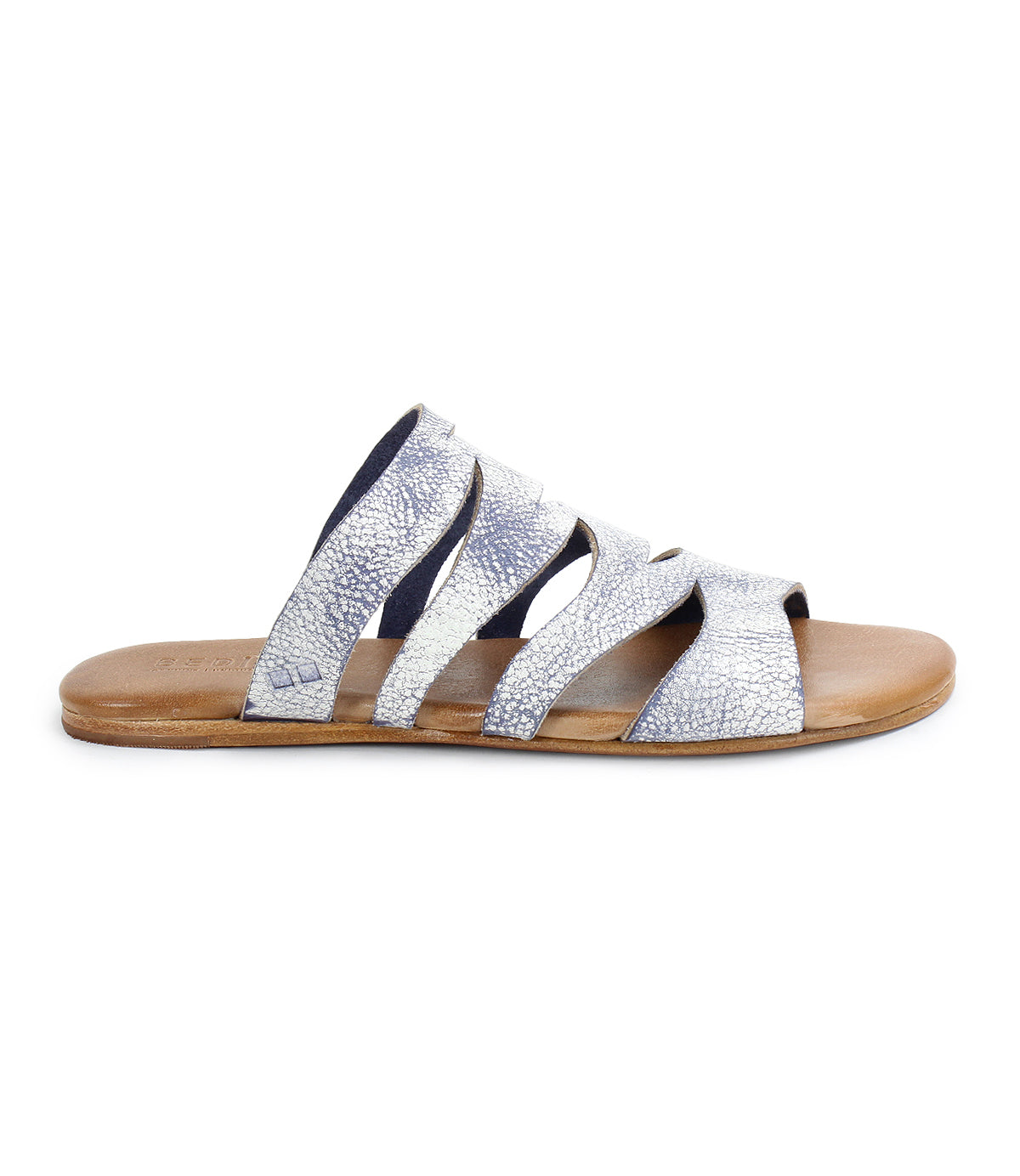 Introducing the Margin by Bed|Stü: a silver strappy slide sandal crafted with a leather upper, flat tan sole, and textured finish—shown from the side on a white background. This elegant design is a must-have addition to your summer wardrobe.