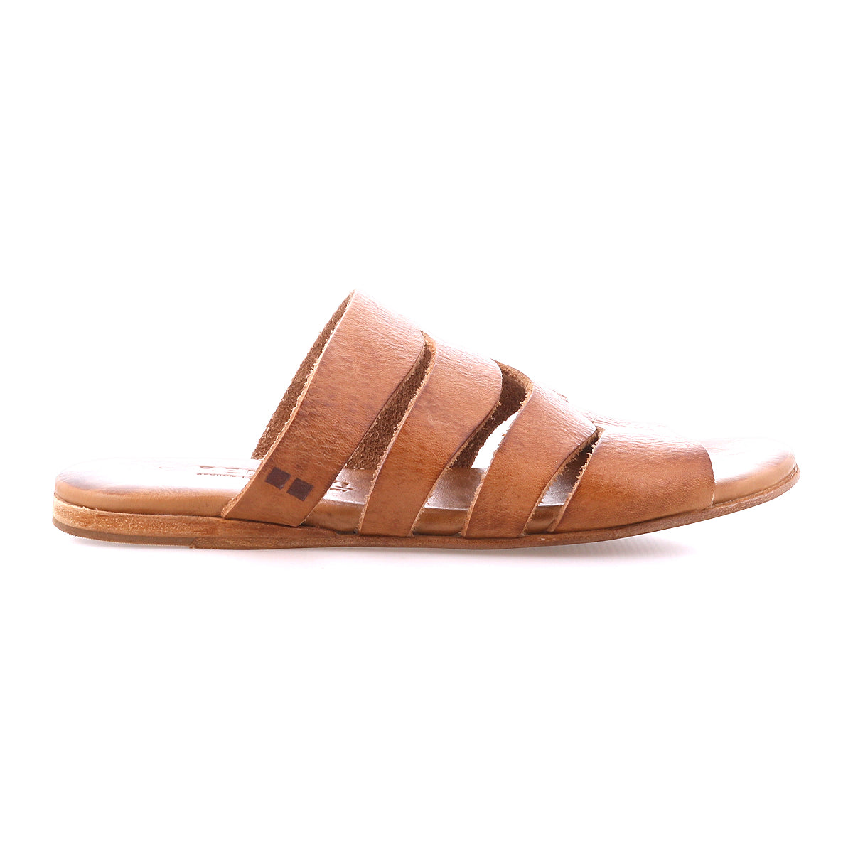 The Bed|Stü Margin is a brown leather slide sandal with a leather upper, featuring three horizontal straps and a flat sole. Seen in side profile against a white background, it's an essential addition to any summer wardrobe.